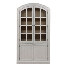 a white bookcase with glass doors on the top and bottom shelves, against a white background