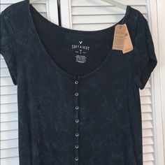 Nwt Never Worn! Shirt Is An Xs But Is Oversized, Would Fit A Xs-M. Material Is So, So Soft And Comfortable! Hemline Is Slightly High-Low, And Has Little Slits On Each Side As Pictured. Top-Rated Seller! All Items Ship Next Day! All Reasonable Offers Considered. 15% Discount On Bundles! Feel Free To Ask Me Any Questions(: Happy Poshing! Black Graphic Print Scoop Neck Top, Black Graphic Print Top With Scoop Neck, Black Scoop Neck Top With Graphic Print, Casual Black Soft-washed T-shirt, Casual Black Scoop Neck T-shirt, Black Soft-washed Casual T-shirt, Casual Graphic Print Scoop Neck Top, Black Soft-washed T-shirt For Loungewear, Soft-washed Black T-shirt For Loungewear