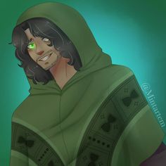 a man with green eyes wearing a hoodie