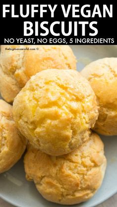 fluffy vegan biscuits on a plate with text overlay