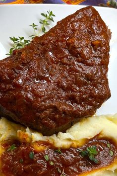 meatloaf and mashed potatoes on a white plate