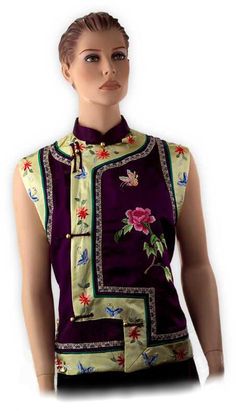 - This Silk Rose and Butterfly Embroidered Sleeveless Chinese Blouse is made of 100% Silk with 100% Cotton lining. Sold individually, - On SALE - From $75.00, now only $30.00! - Processing Time: 1 to 2 Business Days (Excludes Shipping Time) - Sleeveless. Mandarin collar. - Hand-embroidered floral pattern - Silk Chinese button knots - Dry-clean recommended - Available in women's sizes - Imported from China. Ships from PA, USA A young and fresh look starts with this Silk Rose and Butterfly Embroid Traditional Sleeveless Summer Vest, Traditional Summer Vest, Traditional Sleeveless Spring Vest, Traditional Sleeveless Vest For Spring, Multicolor Embroidered Sleeveless Vest For Spring, Traditional Sleeveless Tops For Spring, Qipao Top, Chinese Blouse, Chinese Button