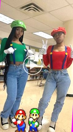 two women dressed up as mario and luigi