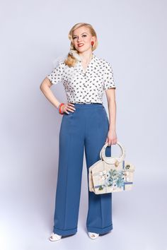 vintageblue coloured wide, high waisted pleat- front trouser with side button fancing  (anchor) on the left side and creases. The trouser has 4 cm turn ups. The fabric is a polyester/ viscose/elastane mix. material: 63%Polyester, 32% Viskose, 5% Elastan machinewashing soft program 30 degrees 1940s Pants, 1950s Pants, 30s Outfits, 1930s Outfits, Picnic Vibes, Vibes Outfit, 1970's Fashion, Sailor Pants, Overall Jumpsuit