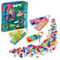 a box with lots of colorful beads in it and some toys on the bottom shelf