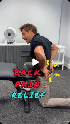 a man sitting in an office chair with back pain relief