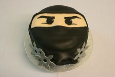 a cake with a ninja face on it