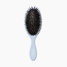 riogeo’s Vegan Boar Bristle Brush gently detangles straight, wavy, curly or coiled hair for a smooth healthy-looking finish. This lightweight brush is engineered to perfection featuring soft ballpoint tips to gently massage scalp, multi-layered bristles to detangle every strand, and a durable handle to withstand all hair types. Vegan and Cruelty-Free. Coiled Hair, Boar Brush, Bristle Hair Brush, Boar Bristle Hair Brush, Performance Hairstyles, Boar Bristle Brush, Hair Coils, Latest Hair Trends, Makeup Sale