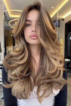 Take a look at these 35 super pretty butterfly haircut ideas that are perfect for '24. From styles like the long butterfly cut on brown hair with highlights you see here to butter blonde styles with bangs and retro vibes, there's a ton of haircut inspo in our latest article. Tap to see it now or save this pin for later! Butterfly Haircut With Color Highlights, Butterfly Haircut With Blonde Highlights, Butterfly Cut With Highlights, Butterfly Haircut With Highlights, Butterfly Haircut Brown Hair, Haircut Ideas For Long Hair With Bangs, Brown Long Hair With Layers, B2s Hairstyles, Butterfly Cut Long Hair