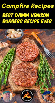 two hamburger patties sitting on top of a wooden cutting board next to some vegetables