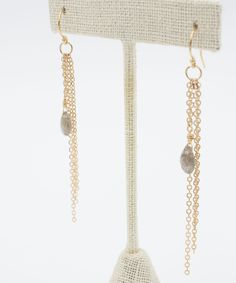 Multiple strands of glittering gold-filled chain add major movement to our Ada Fringe Drop Earrings. Accented with a single Labradorite teardrop, this style says confident and fun.DETAILS » Measurements: 2.75" drop from ear | 0.3" wide » Materials: Labradorite Gemstones | 14k Gold-Filled ear wires and chain » Handcrafted in Florida » Style: ADAE02L Indigo Design, Florida Style, Wedding Sale, Tiny Treasures, Earrings Statement, Fringe Earrings, Top Gifts, Chain Earrings, Gold Filled Chain