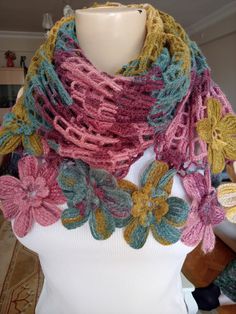 I carefully made a winter neck scarf decorated with crocheted flower motifs. Our elegant looking product is presented to you. It is 78.75 inches tall, 15.75 inches wide and the flowers are 3.9 inches. I hope you like it too. Hand Knitted Yarn Shawl For Winter, Winter Hand Knitted Yarn Shawl, Crochet Lace Shawl For Winter, One Size, Crochet Lace Shawl One Size For Winter, Winter Crochet Lace Shawl One Size, Winter Crochet Patterns In Acrylic, One Size Crochet Lace Shawl For Winter, Handmade Yarn Shawl For Winter, Bohemian Crochet Knitting Pattern For Winter