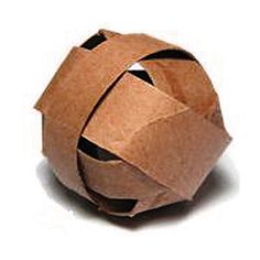 an origami ball made out of brown paper