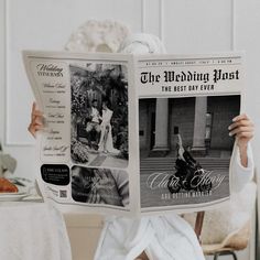 a woman holding up a newspaper with photos on it