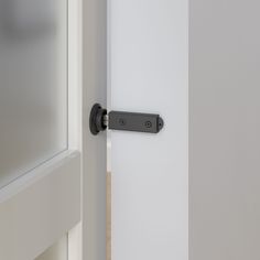 Adds privacy to your interior sliding barn door. Sleek style sliding latch recommended for use on single, bi-parting or bypassing wooden doors. Adds privacy and prevents door from being opened. Includes emergency release to prevent being locked in or out. Accommodates single doors 1-3/8-in to 1-3/4-in thick. Can be installed from either side of the door. Finish matched to complement our designer, classic and builder hardware kits. National Hardware Matte Black Indoor/Outdoor Single & Double Barn Door Lock | N700-150 Modern Barn Door Lock, Barn Door With Lock, Barn Door Lock, Bedroom Barn Door, Exterior Barn Doors, Barn Door Locks, Modern Barn Door, Double Barn Doors, Interior Sliding Barn Doors