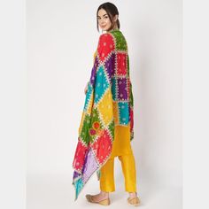 Introducing our Vibrant Multicolor Dupatta, a lively and eye-catching accessory that exudes contemporary charm. Crafted from premium organza fabric, this dupatta features a captivating design of colorful boxes arranged in a dynamic pattern. This dupatta drapes gracefully, offering both style and comfort. Whether paired with a casual ensemble for a pop of color or layered over a solid-colored outfit for a bold statement, this vibrant multicolor dupatta is sure to turn heads and brighten up any occasion with its exuberant flair. SPECIFICATIONS: Material : Organza Work type : Zari Pattern Type: Embroidery  Color : Multicolor  Length : 2.5 m Width : 1.25 m Danglers : None Care: Dry clean only Multicolor Silk Sets With Resham Embroidery, Multicolor Silk Kurta In Bollywood Style, Multicolor Silk Bollywood Kurta, Multicolor Chanderi Bollywood Sets, Multicolor Bollywood Chanderi Sets, Bollywood Multicolor Chanderi Sets, Summer Multicolor Semi-stitched Salwar Kameez, Multicolor Chanderi Sets In Traditional Drape, Semi-stitched Multicolor Silk Kurta