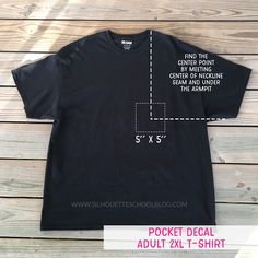 a black t - shirt with the text pocket decal about 2xl on it