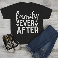 "Kids Family T Shirt Family Ever After Adoption Tee Mom Shirts Parents Matching Shirts Let everyone know you're great ending is family ever after in this adorable pro adoption shirt. This is a great tee for Dads, Moms, Kids, Babies, Aunts and so much more. Show off how proud you are of your family in this family ever after tee. Soft, ring spun cotton t-shirt. Machine wash and dry. Features a tear away tag for comfort and includes a drawstring cotton gift bag. Direct to garment printed using the Casual Cotton T-shirt For Family Events, Family Matching Tops With Letter Print For Gatherings, Cute Letter Print Tops For Family Events, Family Matching Shirt With Letter Print For Events, Family Matching Letter Print Shirt For Family Events, Cotton Tops For Family Gatherings On Father's Day, Cotton Top For Family Gatherings On Father's Day, Funny Family Shirt With Letter Print, Funny Letter Print T-shirt For Family Events