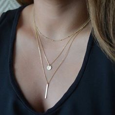 This delicate gold-plated necklace is perfect for creating a layered look. The shortest layer is 14" long, and the extender adds an extra 2" of length, so you can wear it at the perfect length for you. The three layers are connected by a dainty chain, and the pendant is a beautiful bar and disc chain design. It's the perfect piece to add a touch of glamour to any outfit. Gold-Plated Triple Layer Necklace Gold Bar & Gold Disc Pendants 14" (at shortest) + 2" extender Dainty Lightweight Three Chain Necklace, Vintage Chain Necklace, Wholesale Necklaces, Cheap Necklaces, Crystal Fashion, Golden Necklace, Coin Pendant Necklace, Multi Layer Necklace, Star Pendant Necklace