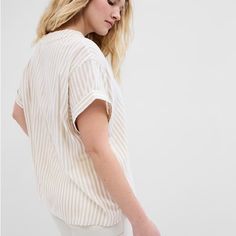 New With Tags. Straight Easy Fit. Hits At Hip. Short Sleeves With Folded Cuffs. V-Neck. Slits At Hem. 55% Cotton. 45% Rayon. Machine Washable Cold. Tumble Dry On Low. Chic White V-neck Top For Day Out, White Relaxed Fit V-neck Top, Casual White Relaxed Fit V-neck Top, Casual White Split Neck Top, White Relaxed Fit V-neck Top For Spring, White V-neck Top For Workwear, White Casual V-neck Blouse, Casual White V-neck Blouse, Neutral V-neck Top For Day Out