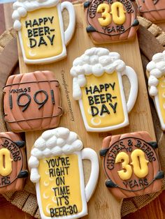 decorated cookies with beer mugs and the words happy beer day