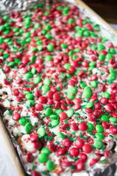 a sheet cake covered in candy and sprinkles