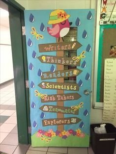 a classroom door decorated with directional signs