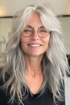 Save this pin for the best shag hairstyles for women over 50. This effortlessly chic long shag features tousled, textured layers that add volume and movement to the hair. The face-framing layers soften the features and look fantastic with glasses. Long Prom Hair, Shaggy Layered Hairstyles, Textured Layers, Framing Layers, Hairstyles For Women Over 50, Natural Gray Hair, Messy Short Hair