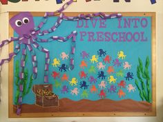 a bulletin board with an octopus and other sea creatures on it that says dive into preschool