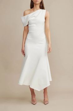 A luxurious addition to the collection, the Corbyn Dress in Ivory is a timeless silhouette. Off the shoulder design, fitted at the bodice and relaxed toward the ankle with an asymmetrical hem. Accentuated seams add a textured finish ~ this style is a great option for bridesmaids.- Midi dress- Off the shoulder design- Fitted at the bodice, relaxed toward the hem- Asymmetrical hem- Invisible back zipModel wears a size 8AU / 4USComposition: 100% Polyester Midi Bridesmaid Dress, Shoulder Design, Asymmetrical Hem, Asymmetric Hem, The Collection, Bridal Gowns, Off The Shoulder, Bodice, White Dress