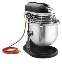 a black and silver mixer with a red cord attached to the side on a white background