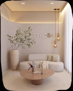 a living room filled with furniture and a plant in a vase on top of a table