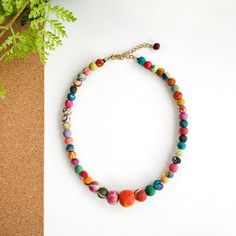 Kantha Graduated Choker | WorldFinds Adjustable Multicolor Eclectic Necklace, Multicolor Single Strand Choker, Artisan Multicolor Choker With Large Beads, Bohemian Adjustable Single Strand Choker, Bohemian Single Strand Beaded Choker Necklace, Bohemian Wooden Bead Choker Necklace, Bohemian Festival Choker With Single Strand, Bohemian Festival Single Strand Choker, Keychain Clip