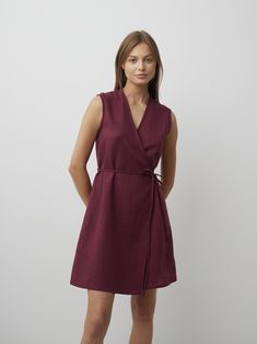 "BROOKE is an elegant sleeveless mini wrap dress. DETAILS - True wrap closure - Sleeveless design - Mini length - Oeko-Tex certified 100% local washed midweight linen - Cut and sewn to order just for you in our studio COLOR - Eggplant, you can also choose other colors above - Fabric samples are available here https://www.etsy.com/listing/586569696/linen-fabric-samples SIZING & FIT - Fit true to size - Model is 5'10\" / 178cm tall and wears size S CARE FOR LINEN - Machine wash up to 30ºC/86ºF gentle cycle - Lay flat to dry or tumble dry low - Warm iron if needed - Do not bleach SIZE GUIDE Size conversion guide Size XS (US 0-2, IT 36-38, UK 4-6, Japan 3-5, France 32-34) Size S (US 4-6, IT 40-42, UK 8-10, Japan 7-9, France 36-38) Size M (US 8-10, IT 44-46, UK 12-14, Japan 11-13, France 40-42) Sleeveless Wrap Dress For Spring Workwear, Sleeveless Wrap Dress For Work, Sleeveless Wrap Dress With Tie Waist For Work, Linen Wrap Dress, Sleeveless Linen Dress, Studio Color, Mini Wrap, Open Back Dresses, Linen Skirt