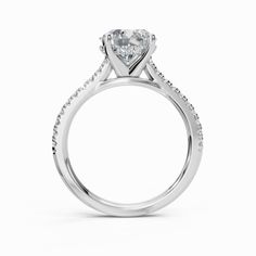 a diamond engagement ring on a white background