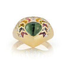 Behold the captivating elegance of our Wishing Well Shield Ring in Feather. Crafted to perfection Luxury Tourmaline Cabochon Rings, Luxury Tourmaline Emerald Ring, Luxury Tourmaline Rings, Luxury Polished Tourmaline Rings, Luxury Multi-stone Sapphire Ring With Tourmaline, Luxury Multi-stone Tourmaline Ring, Symbols Of Hope, Zig Zag Ring, Wishing Wells