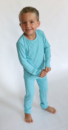 Our long sleeve pajama sets are made of the softest, dreamy ribbed bamboo fabric. Patterns coordinated with all sizes for matching sibling sets. Features: 95% Viscose from Bamboo, 5% Spandex Tagless – tops and bottoms No buttons or snaps Snug Fit – not treated with flame retardants or chemicals OEKO-TEX Certified Care Instructions: Machine wash cold (gentle cycle wash preferred) Tumble dry low or air dry Accessories sold separately Solid Color Long Sleeve Bedtime Set, Solid Color Long Sleeve Sleep Sets, Ribbed Long Sleeve Loungewear Sets, Solid Ribbed Loungewear Set, Long Sleeve Lounging Sets In Solid Color, Solid Long Sleeve Sleepwear For Loungewear, Ribbed Solid Color Sleepwear For Loungewear, Solid Ribbed Sleepwear For Loungewear, Cotton Ribbed Sleepwear