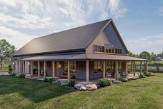 a rendering of a house in the middle of a grassy area with trees and bushes