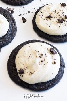 cookies with cream filling and oreo cookies on the side, ready to be eaten