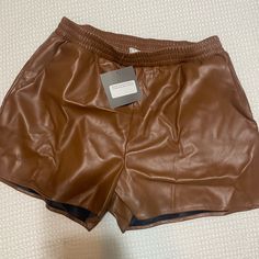 New With Tags. Camel Brown Leather Shorts. Size Medium. Trendy Brown Shorts For Night Out, Casual Brown Shorts For Night Out, Brown Leather Shorts, Leather Shorts, Chunky Sweater, Split Hem, Tall Boots, Tan Brown, Brown Leather