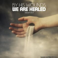 a person's hand reaching out to the sky with a message above it that reads, by his wounds we are healed