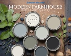 the modern farmhouse home paint palette is on display next to some leaves and nuts, along with other items