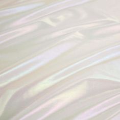 a close up view of a bed sheet with white and pink sheetspread on it