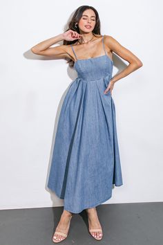 An artfully washed midi dress in soft denim, boasting a sleek straight neckline and delicate shoulder straps finished with inverted pleats. The exquisite back tie closure adds a touch of elegance to this effortlessly chic piece.Details:Self : 90% Cotton 10% PolyesterSize & Fit- Model is 5`7" And Wearing Size Small- Measurements Taken From Size Small- Approx. Length: 51" Denim Midi Dress, Denim Dresses, Flying Tomato, Skirt Jumpsuit, Straight Neckline, Sweatshirt Dress, Denim Wash, Shoulder Straps, Dress Skirt