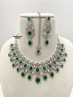 American Diamond Necklace Set/CZ Necklace/ Reception Jewelry/Statement Necklace Set/silver green     All items are shipped from Brampton, Ontario, Canada. If you need your item by a certain day, please reach out to us for express delivery option before placing the order so that we can update the shipping for you. Standard shipping/delivery timeline Below are the delivery timeline estimates once the order is shipped. ---> USA delivery timeline * 3-6 business days to major urban centers in USA. It Green Jeweled Necklace For Anniversary, Green Jeweled Necklaces For Anniversary, Dazzling Green Emerald Necklace For Formal Occasions, Dazzling Green Emerald Necklace, Dazzling Green Diamond Necklaces, Dazzling Green Diamond Necklace, Dazzling Green Emerald Necklace For Anniversary, Silver Emerald Jeweled Necklace For Anniversary, Dazzling Silver Bridal Necklace With Stone Setting