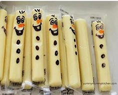 there are many frozen food sticks with faces on them