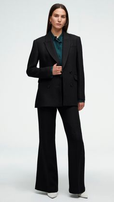 Made of an Italian viscose wool twill, this elevated classic features traditional suiting details like a double-breasted closure, a peak label, sculpted shoulders, and interior pockets. Our Double-Breasted Blazer pairs great with a pair of performance trousers or dressed down with a classic tee and denim combo. Sculpted Shoulders, Slim Blouse, Belted Blazer, Single Button Blazer, High Waisted Flares, Flare Trousers, Womens Blazers, Double Breasted Blazer, Suit Shop