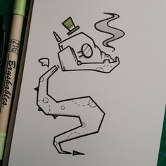 a drawing of a camera on top of a piece of paper next to a marker