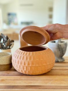 Handmade carved terracotta jar with lid is about 8 inches round and 6 inches tall. 100% Terracotta hand wash only Made in India Jars Pottery, Tera Cotta, Bedroom Moodboard, Terracotta Bowl, Pottery Inspo, Terracotta Pots, Terra Cotta, 6 Inches, Hand Wash