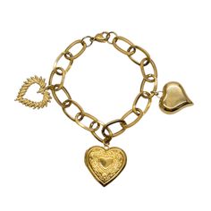 Meet your favorite charm bracelet, Lola! Handcrafted from water and tarnish resistant stainless steel elements, this gorgeous piece is 8” in length, and will clasp shorter as desired. It features three different heart charms, all varying in size and design to create an unforgettable charm piece you will treasure for years to come. Lola has a gorgeous, upscale vintage vibe to its design. Be the "it" girl with this piece, and you will always be asked, "Where did you get that bracelet?!" --8" Lengt Metal Heart Charm Dangle Jewelry, Adjustable Heart-shaped Metal Charm Bracelet, Metal Dangle Jewelry With Heart Charm, Stainless Steel Heart Charm Jewelry, Metal Heart Charm Dangle Charms, Metal Heart Charm Dangle, Metal Dangle Heart Charms, Metal Heart Dangle Charms, Vintage Metal Heart Charm